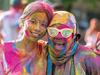 Two happy students at the Holi celebration